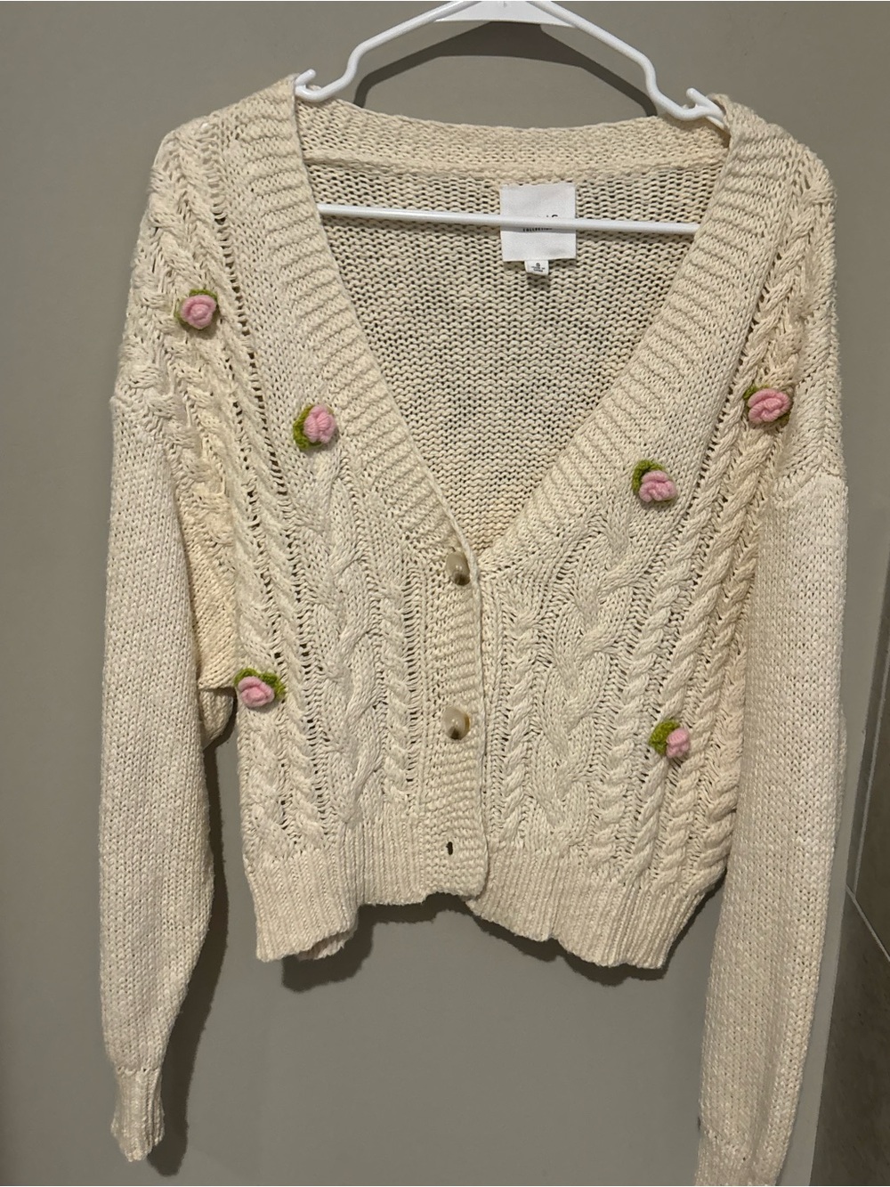 Le Lis Cream Cable-Knit Cardigan with Pink Rose Embellishments